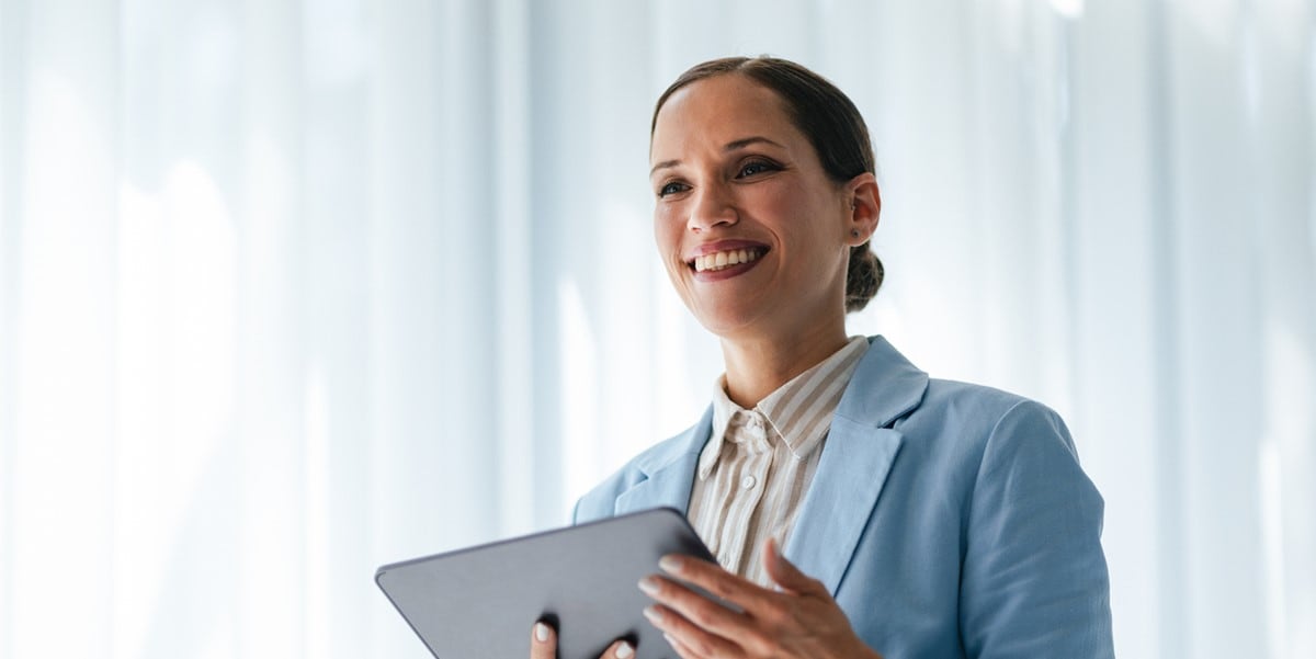 professional woman holding tablet