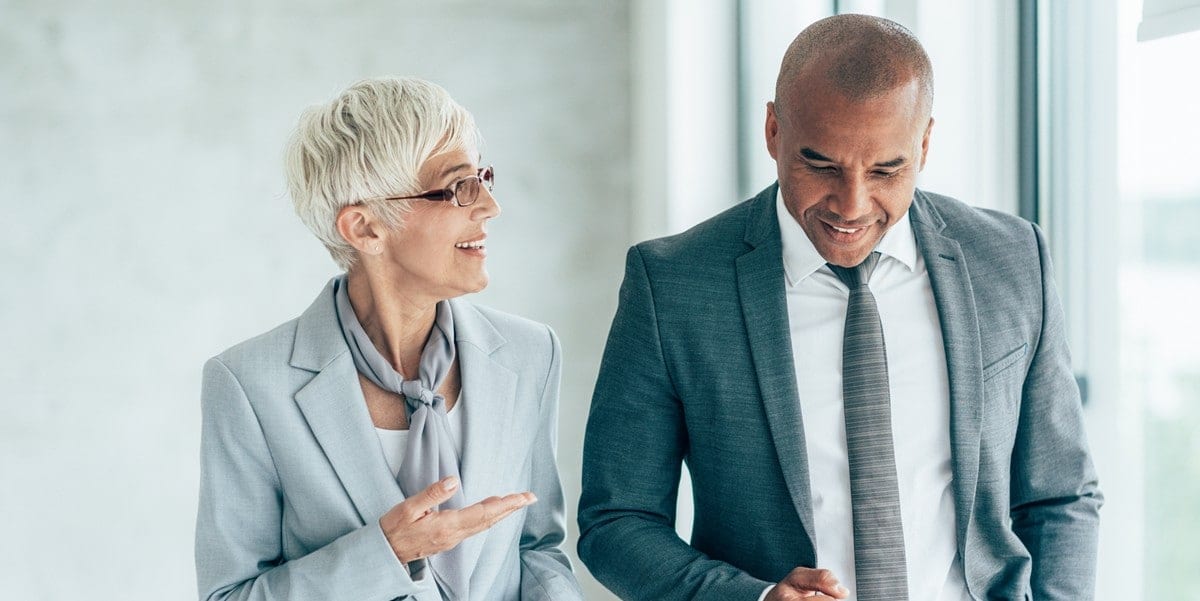 two professionals in the office