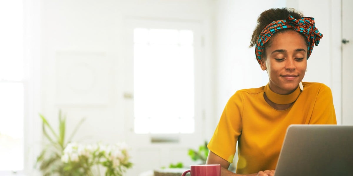 woman working at desk from home